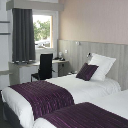 Brit Hotel Dak Hotel Avallon Esterno foto