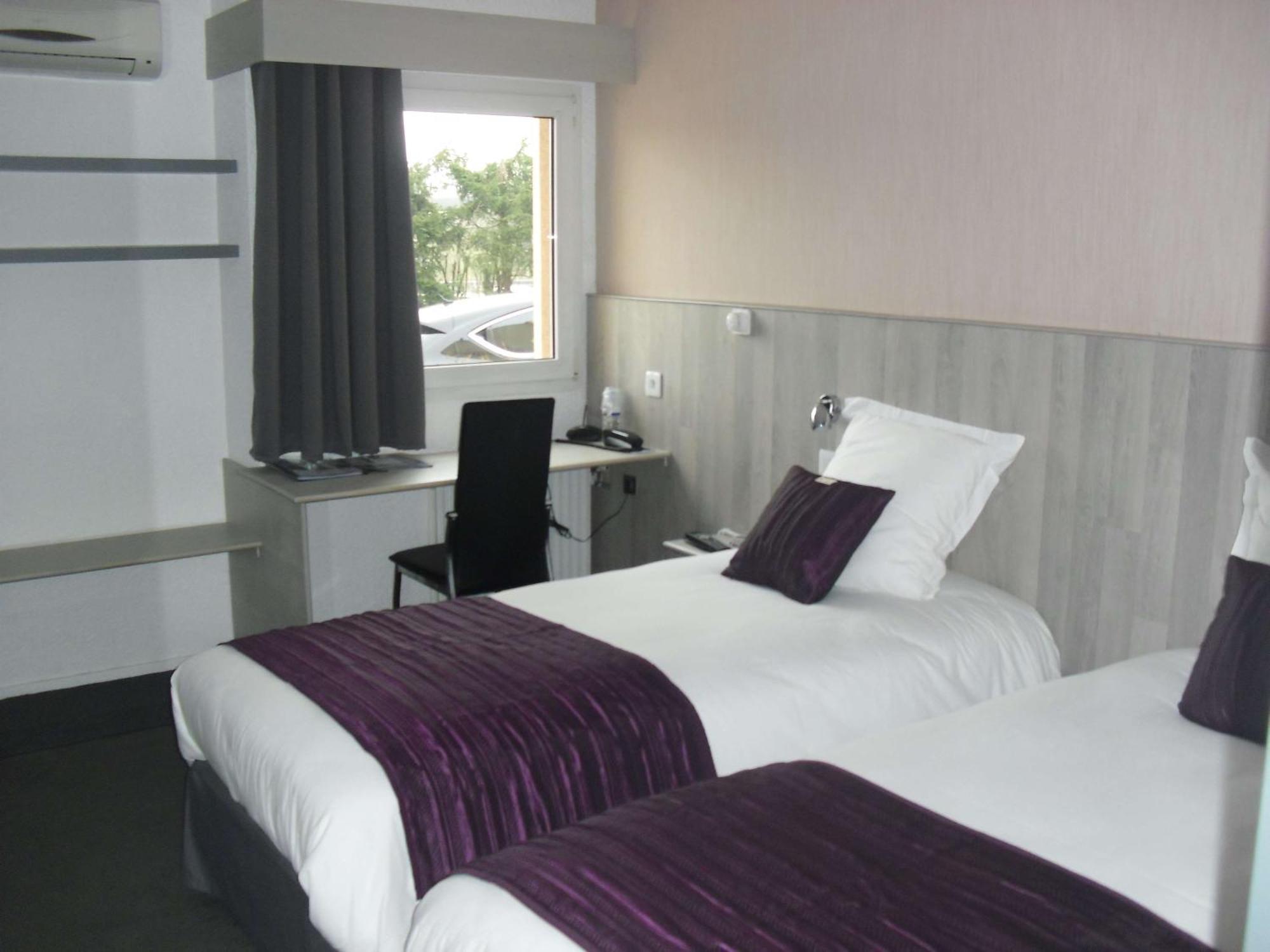 Brit Hotel Dak Hotel Avallon Esterno foto