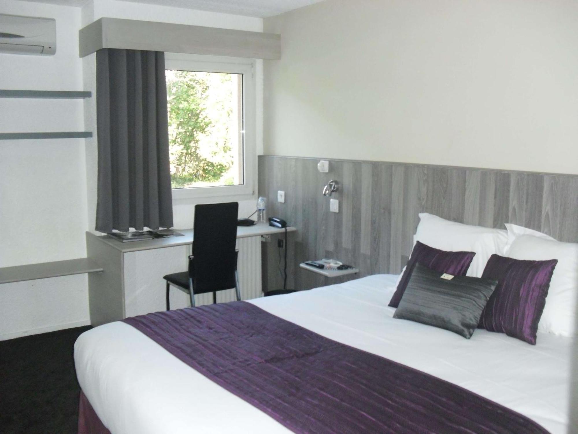 Brit Hotel Dak Hotel Avallon Esterno foto